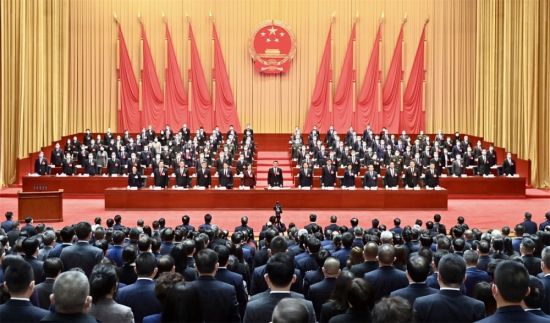 1月17日上午,市六届人大一次会议在庄严的国歌声中闭幕。记者 齐岚森 摄 1月17日上午,市六届人大一次会议在庄严的国歌声中闭幕。记者 齐岚森 摄