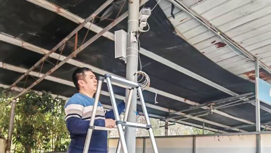 ͼΪ������Ա��װ��������ͷ���й��ƶ����칫˾��ͼ