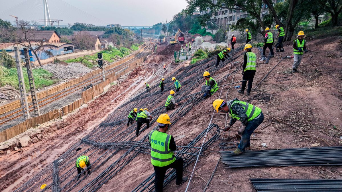 图为成渝铁路改扩建项目建设现场。中国铁路成都局集团有限公司 供图 图为成渝铁路改扩建项目建设现场。中国铁路成都局集团有限公司 供图