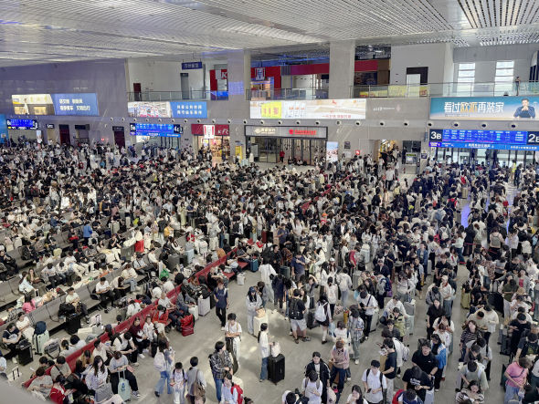图为万州北站的旅客。中国铁路成都局集团有限公司涪陵车务段 供图 图为万州北站的旅客。中国铁路成都局集团有限公司涪陵车务段 供图